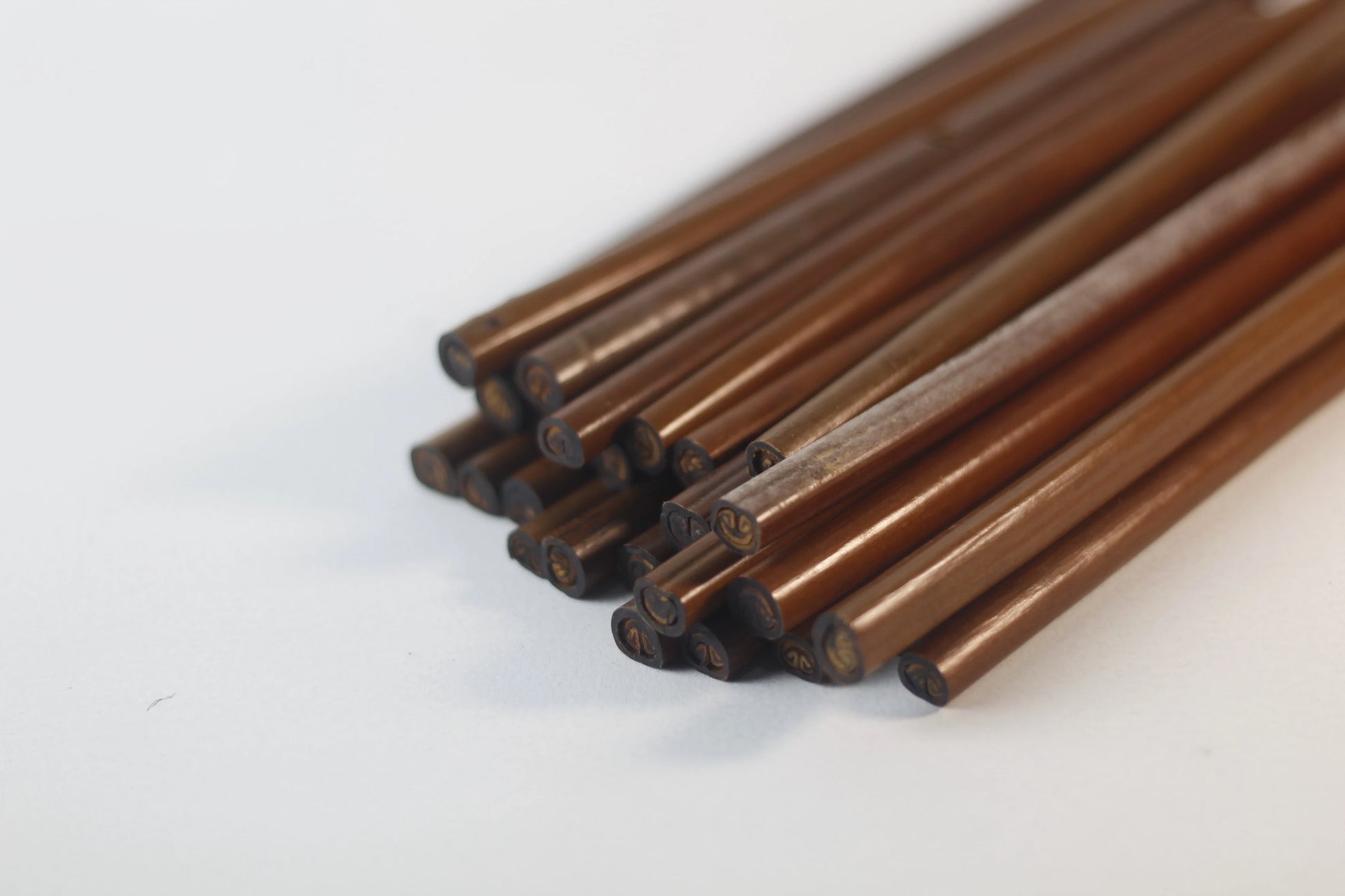 Handam Bili reed pen next to ink pot