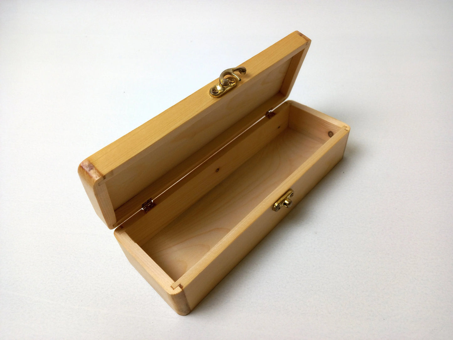 Front view of teak calligraphy pen storage box