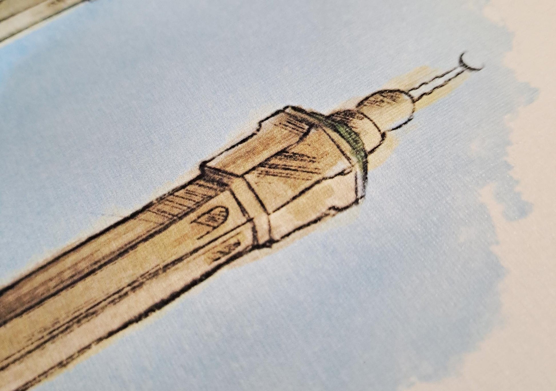 Zoomed view of twin minarets from Masjid al-Haram in watercolor print, showing architectural detail