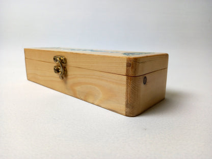 Side hinge detail on teak pen storage box