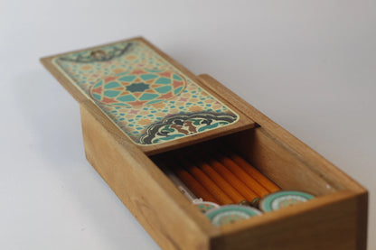 detail of sliding lid close on teakwood calligraphy box