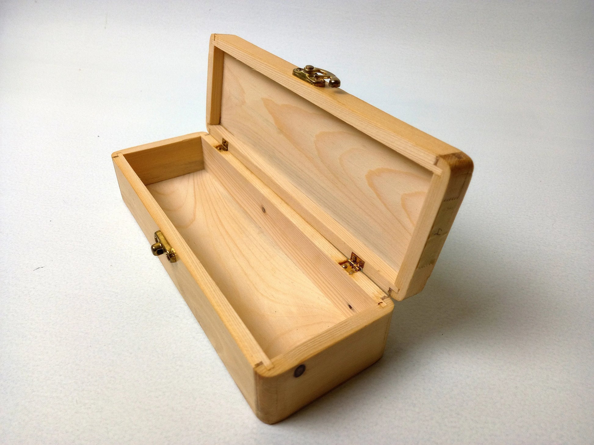 Teak calligraphy box containing pens and nibs