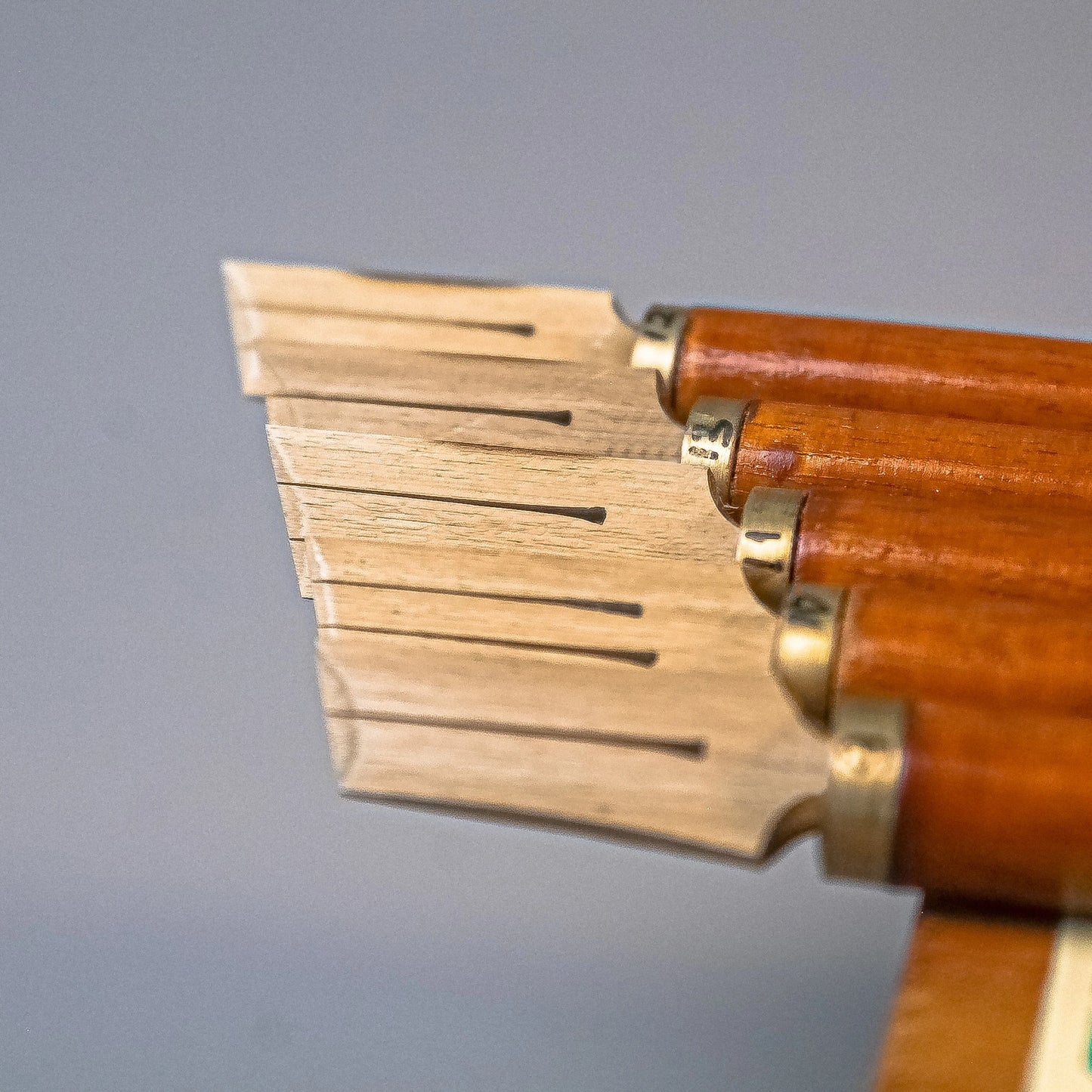 Wooden handle attached to bamboo qalam pen