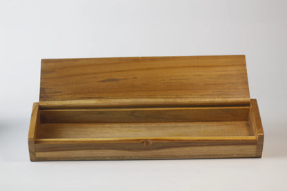 close up of hinge detail on teak wooden box for calligraphy supplies