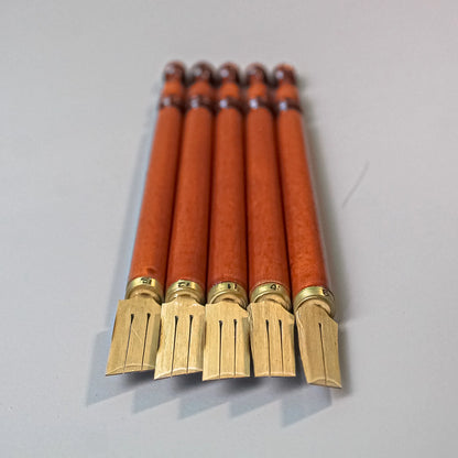 Close up of bamboo qalam pen nib carved slits for ink flow