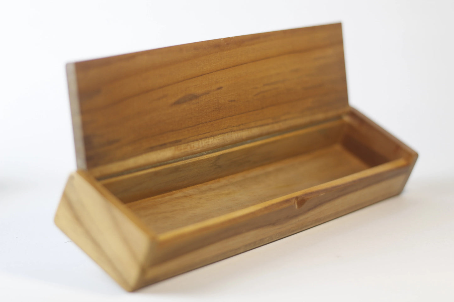 open box showing organized layout for pens brushes ink bottles